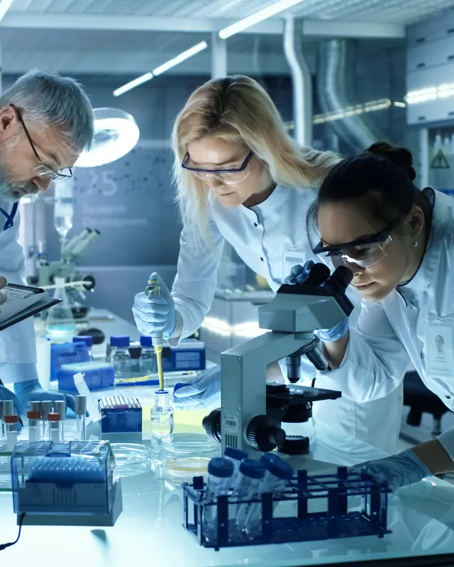 Laboratory scientists analysing samples